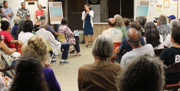 Dr. Sarah Park, state epidemiologist and chief of Disease Outbreak Control Division, talks about dengue fever at the Monday, Nov. 9 community meeting in Captain Cook.