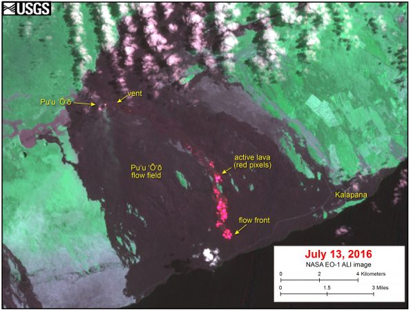 This satellite image was captured on Wednesday, July 13, by the Advanced Land Imager instrument onboard NASA's Earth Observing 1 satellite. The image is provided courtesy of NASA's Jet Propulsion Laboratory. Although this is a false-color image, the color map has been chosen to mimic what the human eye would expect to see. Bright red pixels depict areas of very high temperatures and show active lava. White areas are clouds. The image shows that surface breakouts (red pixels) continue to be active on the pali and coastal plain. The flow front remains roughly 900 m (0.6 miles) from the ocean, with little advancement over the past several days.