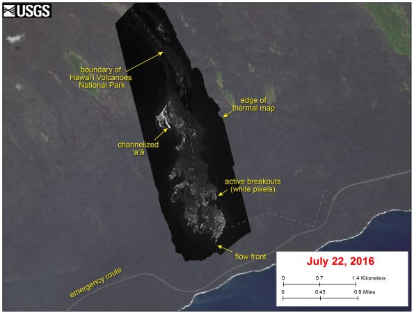 This image shows a thermal map of the flow on the pali and coastal plain, created from airborne thermal images. White pixels are hot, and show areas of active surface breakouts. The background image is a satellite image collected before the current lava flow was active. The thermal map shows minimal activity on the upper pali, with a channelized ʻaʻā flow at the base of the pali. The flow front area had scattered pāhoehoe breakouts, with a narrow lobe of active lava forming the leading tip of the flow. The leading tip of the flow was 730 m (0.45 miles) from the ocean.