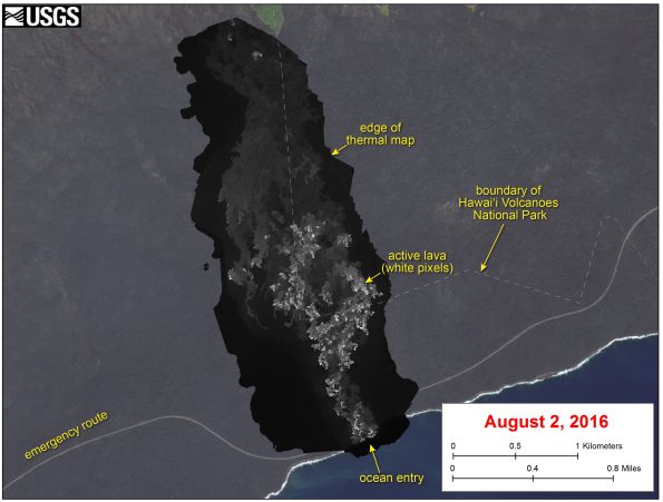 This image shows a thermal map of the flow on the pali and coastal plain, created from airborne thermal images. White pixels are hot, and show areas of active surface breakouts. The background image is a satellite image collected before the current lava flow was active. The thermal map shows scattered pāhoehoe breakouts on the coastal plain, with a narrow lobe of lava crossing the gravel road and extending to the ocean. The ocean entry has widened since it first formed on Tuesday, July 26, and now spans about 240 m (260 yards) of the coastline.