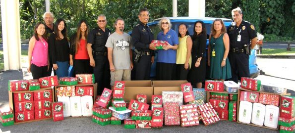 Employees from the Hawaiʻi Police Department donated 136 boxes of Christmas gifts destined for children in need around the world. The boxes were presented to representatives of Operation Christmas Child on Thursday (November 17) at the South Hilo police station. Operation Christmas Child is a yearly community project that reaches out to children in need who have never experienced the kindness of receiving a gift. Shoebox gifts are collected around the state in this international effort to assist those in war torn countries or suffering from famine, sickness and poverty.