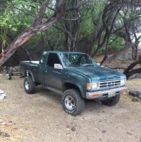 The Coast Guard is searching for two possible persons in the water off of the Big Island, five miles north of Kawaihae and the Kohala district, Dec. 4, 2016. A green Nissan truck and trailer believed to belong to one of the boaters was left at the campsite. (Courtesy photo/Released)