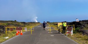 Visitors begin the five-mile hike to Kamokuna shortly after the park opened the lava viewing area on Tuesday, January 3. Today marks the 34th anniversary of the eruption of Pu‘u ‘Ō‘ō vent on Kīlauea, the source of the lava flows going into the ocean today. NPS Photo/Janice Wei