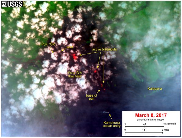 This satellite image was captured on Wednesday, March 8, by the NASA/USGS Landsat 8 satellite. Although this is a false-color image, the color map has been chosen to mimic what the human eye would expect to see. Bright red pixels depict areas of very high temperatures and show active lava. White areas are clouds. The image shows that breakouts continue in several areas on the flow field. The largest breakout is about 2 km (1.2 miles) southeast of the vent. Smaller breakouts are present above and on the pali. Near the base of the pali, on the coastal plain, a small breakout is active. A thermal anomaly is also present at the Kamokuna ocean entry.