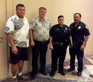 Pictured from left to right: Robert Hickox of Kohanaiki, Randy Crowe of R. Crowe Consulting, Officer Sidra Naki-Brown, and Captain Randal Ishii
