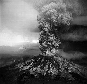 Aerial view of the May 18, 1980, eruption of Mount St. Helens as seen from the southwest. This column of ash and volcanic gas reached a height of about 18.2 km (60,000 ft).