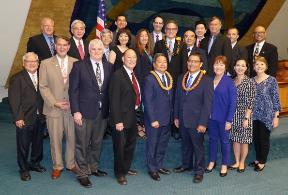 Third Circuit Court judges (with lei) Robert D.S. Kim on left, and Henry T. Nakamoto. Photo courtesy of Hawaii Senate Communications