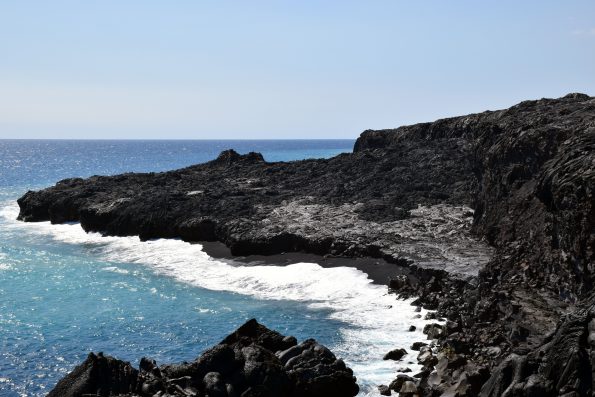 Over the past week, the episode 61g Kamokuna lava delta has been partially resurfaced by viscous, spiny pāhoehoe flows (darker in color). Geologists at the ocean entry today (November 17) did not see an active ocean entry, but lava has intermittently entered the ocean over the past few weeks. A few tiny, and very sluggish, breakouts were visible on the delta near the base of the cliff.