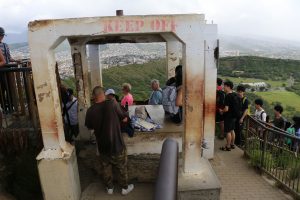 A man sells unpermitted certificates at Diamond Head and was cited by DLNR Division of Conservation and Resources (DOCARE) officers Thursday (March 8). DLNR Photo.