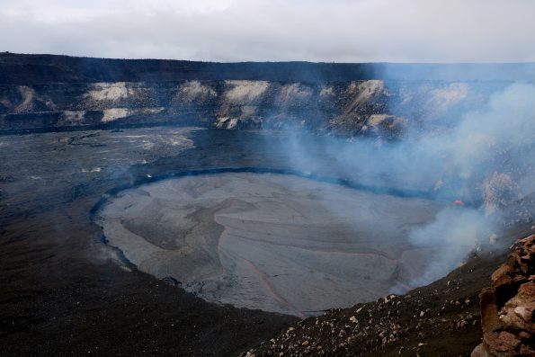 A view of the lava lake this afternoon from the Halema‘uma‘u Crater rim, which remains closed to the public due to ongoing volcanic hazards. Jaggar Museum and HVO are on the skyline in the upper left. Photo taken Saturday, April 21, 2018 courtesy of U.S. Geological Survey