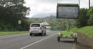 The message board on Kamehameha Highway near the Hawaiian Memorial Park Cemetery will provide Honolulu bound travelers with Pali Highway travel times which will help determine if it is better to take the H-3 Freeway (the message is not displayed in the photograph). Photo courtesy HDOT