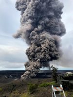 Ash column rises from the Overlook crater at the summit of Kīlauea Volcano. HVO's interpretation is that the explosion was triggered by a rockfall from the steep walls of Overlook crater. The photograph was taken at 8:29 a.m. HST from the Jaggar Museum overlook. The explosion was short-lived. Geologists examining the ash deposits on the rim of Halema‘uma‘u crater found fresh lava fragments hurled from the lava lake. This explosion was not caused by the interaction of the lava lake with the water table. When the ash cleared from the crater about an hour after the explosion, geologists were able to observe the lava lake surface, which is still above the water table. Photo taken Wednesday, May 9, 2018 courtesy of U.S. Geological Survey