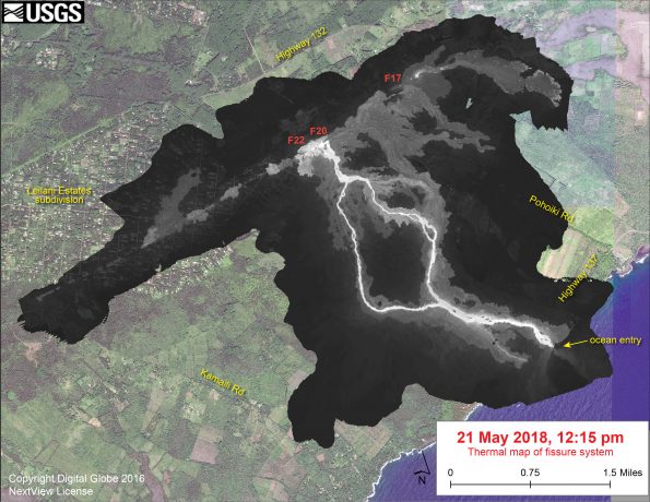This thermal map shows the fissure system and lava flows as of 12:15 pm on Monday, May 21. The primary lava flows originate from the Fissure 20-22 area. The dominant ocean entry is marked. The black and white area is the extent of the thermal map. Temperature in the thermal image is displayed as gray-scale values, with the brightest pixels indicating the hottest areas. The thermal map was constructed by stitching many overlapping oblique thermal images collected by a handheld thermal camera during a helicopter overflight of the flow field. The base is a copyrighted color satellite image (used with permission) provided by Digital Globe.