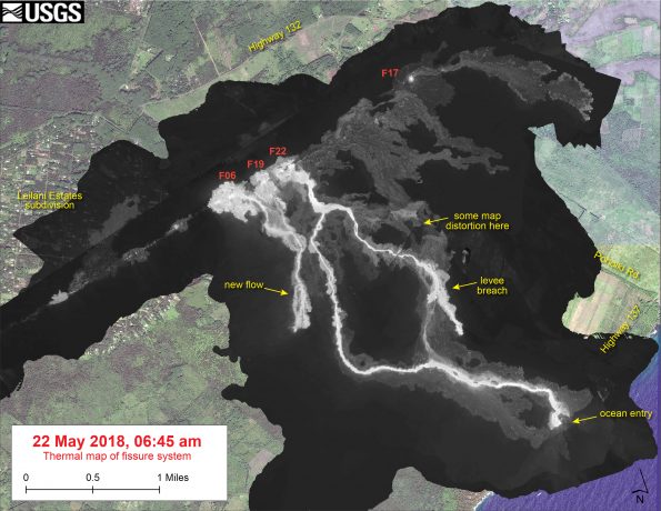 This thermal map shows the fissure system and lava flows as of 06:45 am on Tuesday, May 22. The primary lava flow originates from Fissure 22, but a new flow has been active over the past day from the Fissure 6 area. The black and white area is the extent of the thermal map. Temperature in the thermal image is displayed as gray-scale values, with the brightest pixels indicating the hottest areas. The thermal map was constructed by stitching many overlapping oblique thermal images collected by a handheld thermal camera during a helicopter overflight of the flow field. The base is a copyrighted color satellite image (used with permission) provided by Digital Globe.