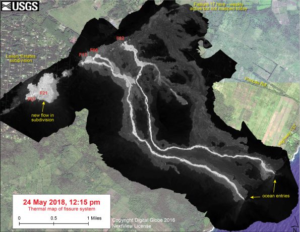 This thermal map shows the fissure system and lava flows as of 12:15 pm on Thursday, May 24. Two channelized lava flows are reaching the ocean. In addition, a new lava flow is active in Leilani Estates subdivision, near Fissure 7. The black and white area is the extent of the thermal map. Temperature in the thermal image is displayed as gray-scale values, with the brightest pixels indicating the hottest areas. The thermal map was constructed by stitching many overlapping oblique thermal images collected by a handheld thermal camera during a helicopter overflight of the flow field. The base is a copyrighted color satellite image (used with permission) provided by Digital Globe.
