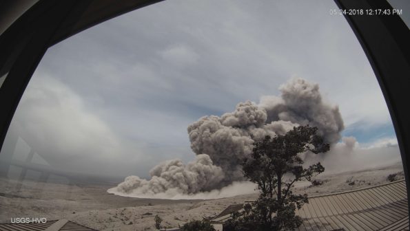 Poor weather at the summit of Kīlauea has obscured views of Halema‘uma‘u for much of today, but a brief break in the weather around noon allowed HVO's webcam to capture this image of an ash plume rising from the crater at 12:17 p.m. HST. Even though weather has obscured visual observations of the ongoing summit explosions, HVO scientists are able to track them using signals from monitoring instruments, such as seismometers. Photo taken Thursday, May 24, 2018 courtesy of U.S. Geological Survey