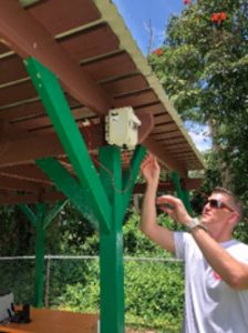 An EPA employee installs a sulfur dioxide (SO<sub><p class=