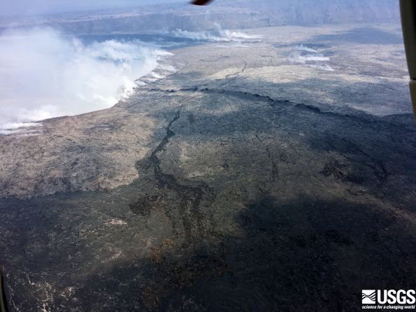Another aerial view showing prominent cracking around Halema‘uma‘u from the ongoing subsidence at Kīlauea's summit. The steaming cracks in the background have been observed for several days. Photo taken Sunday, June 10, 2018 courtesy of U.S. Geological Survey