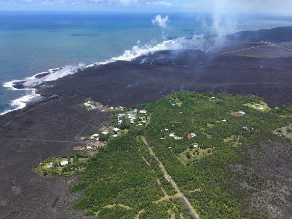 How do you keep people safe when lava is rapidly advancing through communities? This was just one of the topics addressed during the Cities on Volcanoes 10 meeting in Naples, Italy, last week. Lava flows recently erupted from Kīlauea Volcano’s lower East Rift Zone inundated hundreds of homes in the lower Puna District of Hawaiʻi Island. Here, lava enters the Pacific Ocean south of the remaining homes in Kapoho Beach Lots subdivision on June 6, 2018. USGS photo by M. Patrick.
