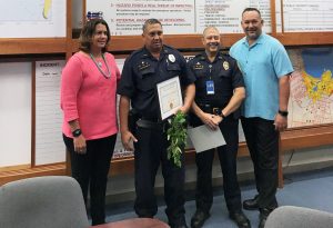 (L-R) Paola Pagan, Officer John Kahalioumi Captain Jeremie Evangelista, Michael Vasquez